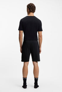 Back image of a model wearing the Boss authentic shorts in black, by brand Boss