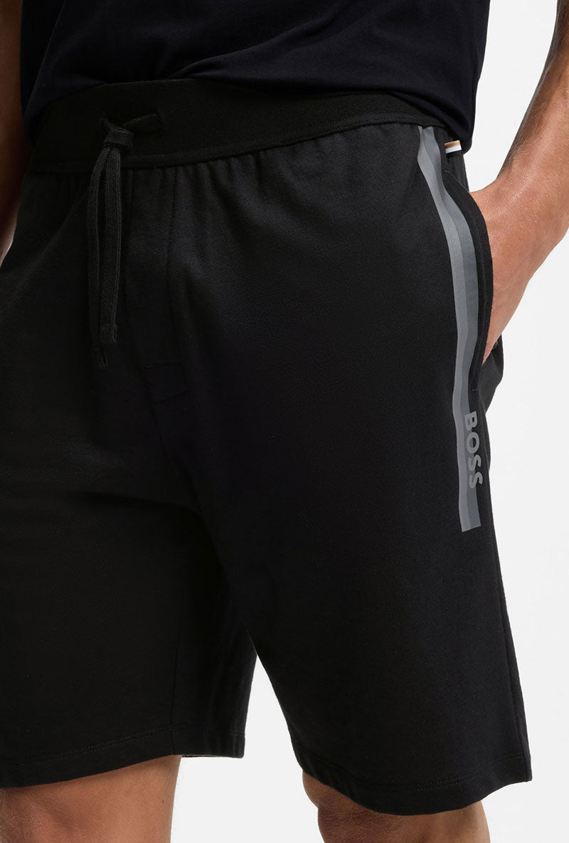 Front detailed image of a model wearing Boss authentic shorts in black, by brand Boss