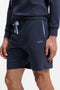 Front image of a model wearing the Boss mix & match shorts in navy, by brand Boss