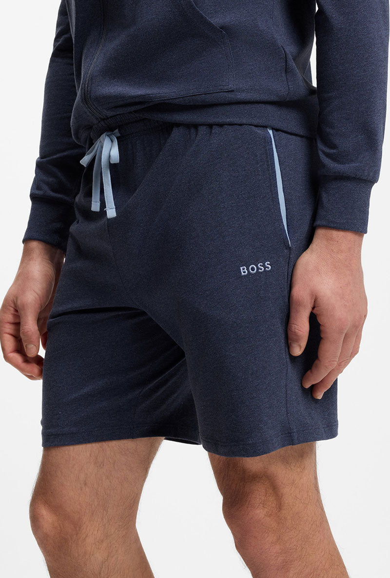Front image of a model wearing Boss mix & match shorts in navy, by brand Boss