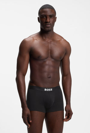 Front image of a model wearing the Boss one 3pk trunks in black, by brand Boss