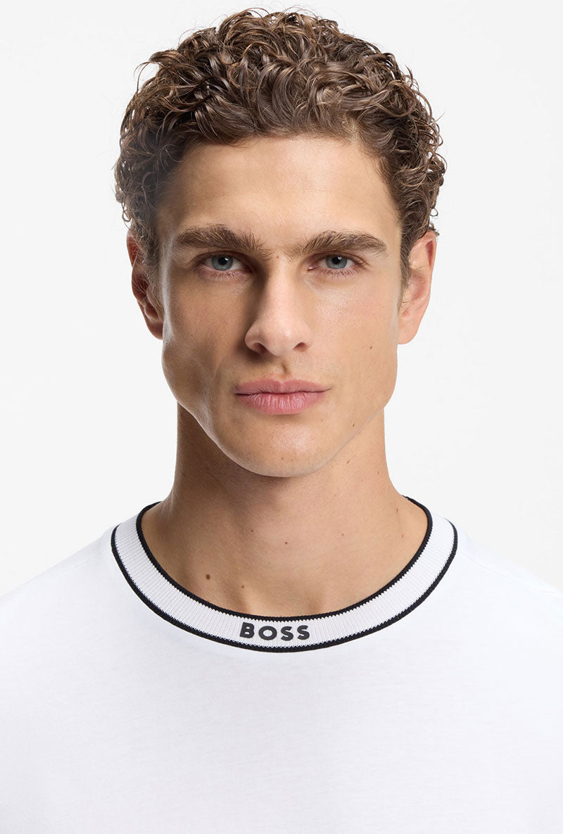 Front detailed image of a model wearing Boss tee 5 t in white, by brand Boss