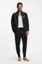 Front image of a model wearing the Authentic jogpants in black, by brand Boss