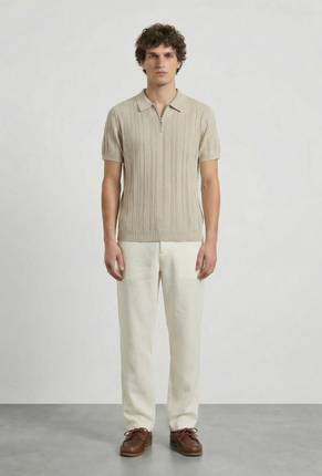 Front image of a model wearing Deep colin zip polo in beige, by brand Deep