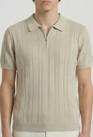 Front detail image of a model wearing the Deep colin zip polo in beige, by brand Deep