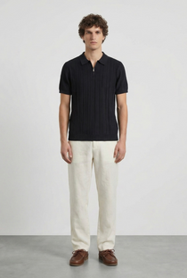 Front image of a model wearing the Deep colin zip polo in black, by brand Deep