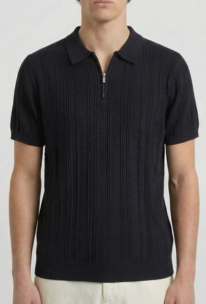 Front detail image of a model wearing the Deep colin zip polo in black, by brand Deep