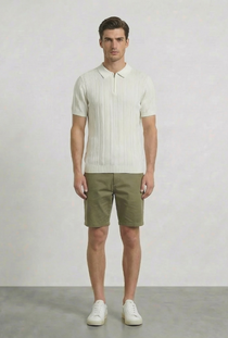 Front image of a model wearing the Deep colin zip polo in white, by brand Deep
