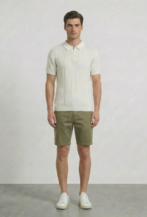 Front image of a model wearing the Deep colin zip polo in white, by brand Deep