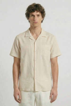 Front image of a model wearing the Deep fusion resort shirt in yellow, by brand Deep
