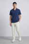 Front image of a model wearing the Deep leroy polo in navy, by brand Deep