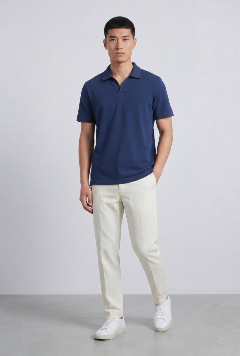Front image of a model wearing Deep leroy polo in navy, by brand Deep