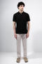 Back image of a model wearing Deep premium polo in black, by brand Deep