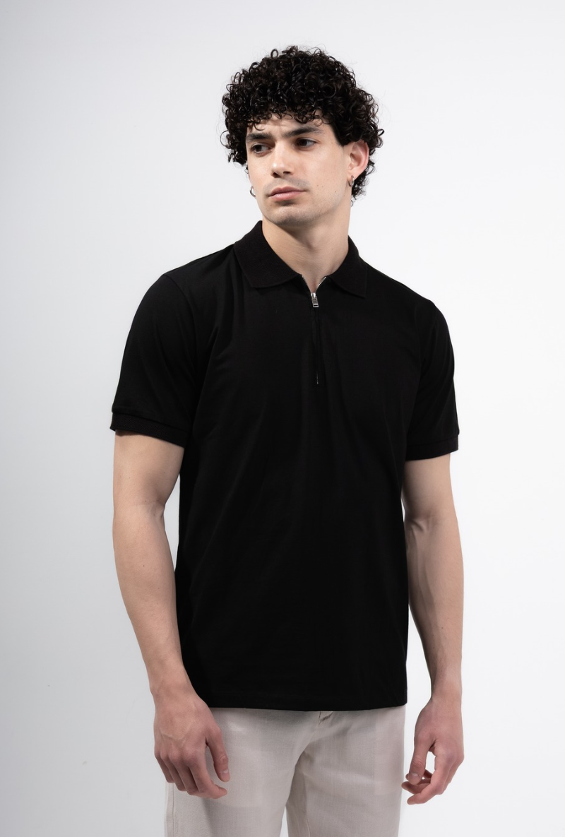 Front image of a model wearing Deep premium polo in black, by brand Deep