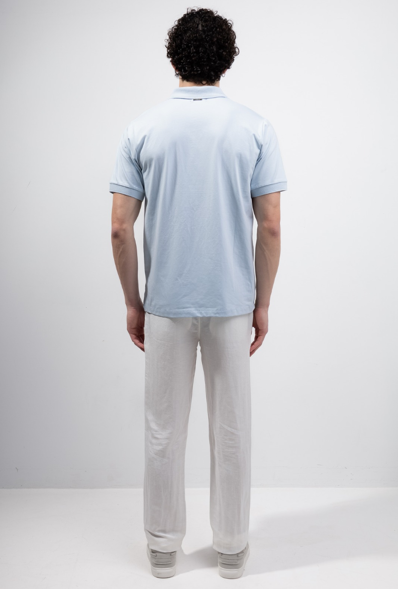 Back image of a model wearing Deep premium polo in blue, by brand Deep