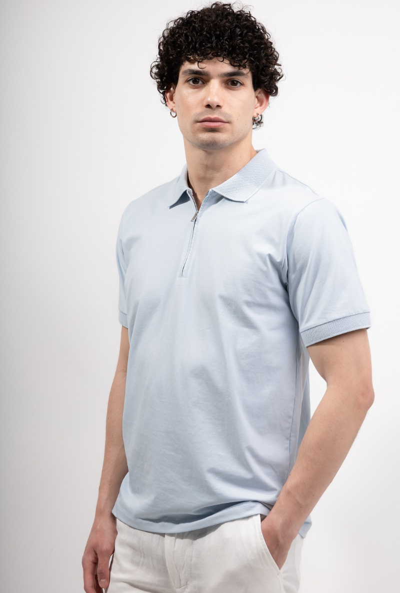 Front image of a model wearing Deep premium polo in blue, by brand Deep
