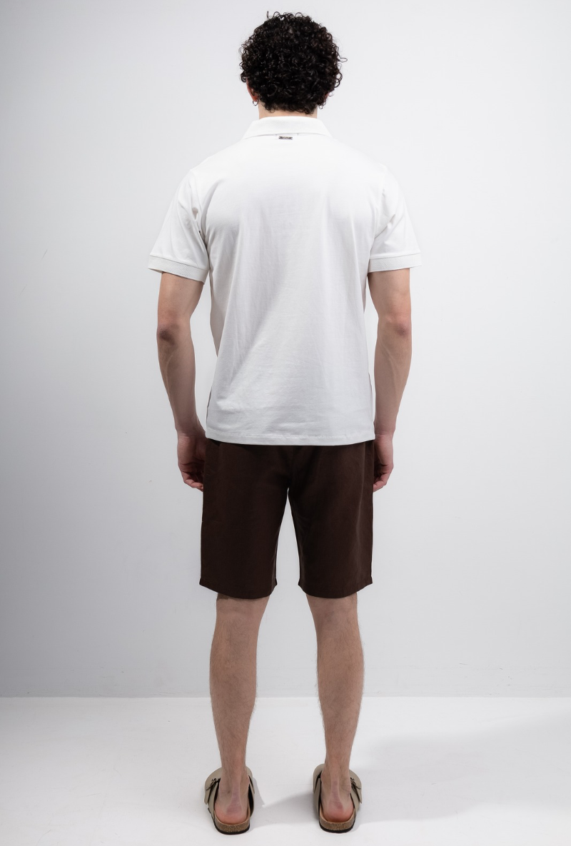 Back image of a model wearing Deep premium polo in white, by brand Deep