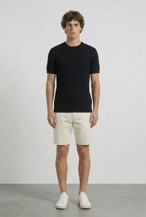 Front image of a model wearing the Deep rex crew neck rib knit in black, by brand Deep