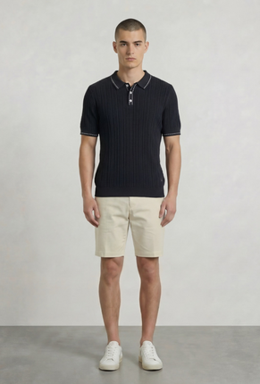 Front image of a model wearing Deep river button knit polo in black, by brand Deep