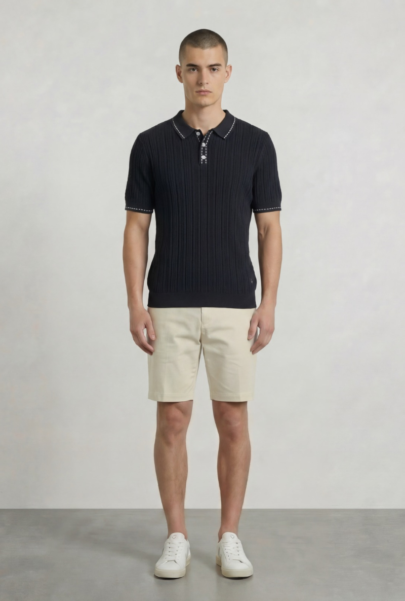 Front image of a model wearing Deep river button knit polo in black, by brand Deep