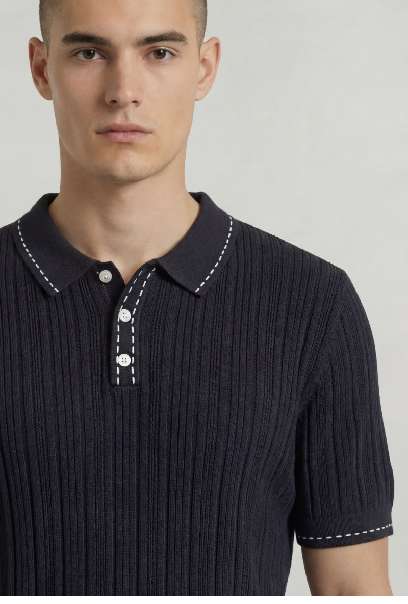Front image of a model wearing Deep river button knit polo in black, by brand Deep