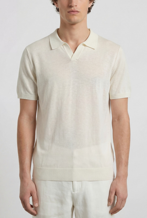 Front image of a model wearing the Deep rocco open neck polo in off white, by brand Deep