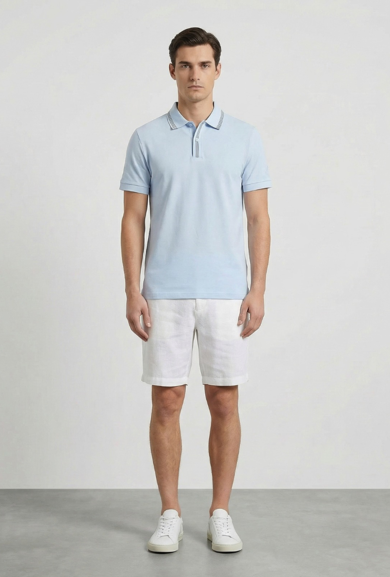 Front image of a model wearing Deep roman button polo in light blue, by brand Deep