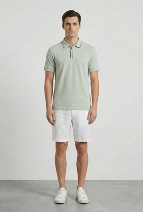 Front image of a model wearing Deep roman button polo in light green, by brand Deep