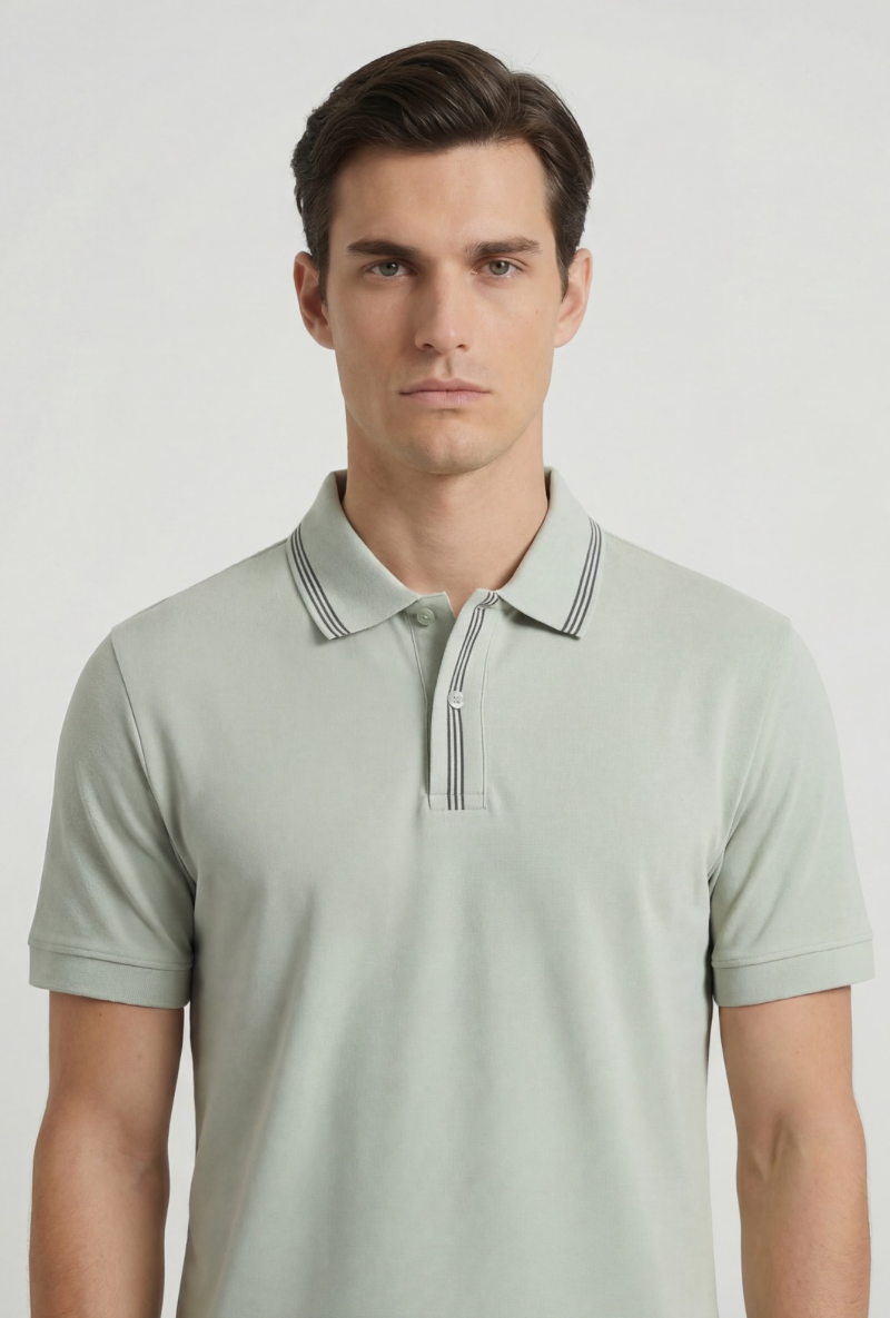 Front image of a model wearing Deep roman button polo in light green, by brand Deep