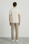 Back image of a model wearing the Deep roman button polo in white, by brand Deep
