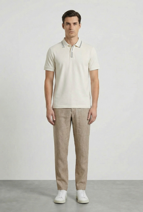 Front image of a model wearing Deep roman button polo in white, by brand Deep