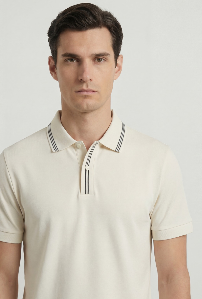 Front image of a model wearing Deep roman button polo in white, by brand Deep