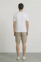 Back image of a model wearing the Deep ronan round neck tshirt in white, by brand Deep