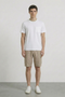 Front image of a model wearing Deep ronan round neck tshirt in white, by brand Deep