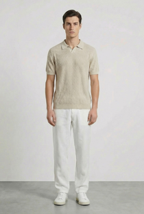 Front image of a model wearing the Deep rory open neck polo in beige, by brand Deep