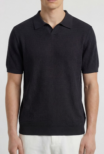Front image of a model wearing the Deep rory open neck polo in black, by brand Deep