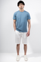 Front image of a model wearing Deep troy ss tshirt in denim, by brand Deep