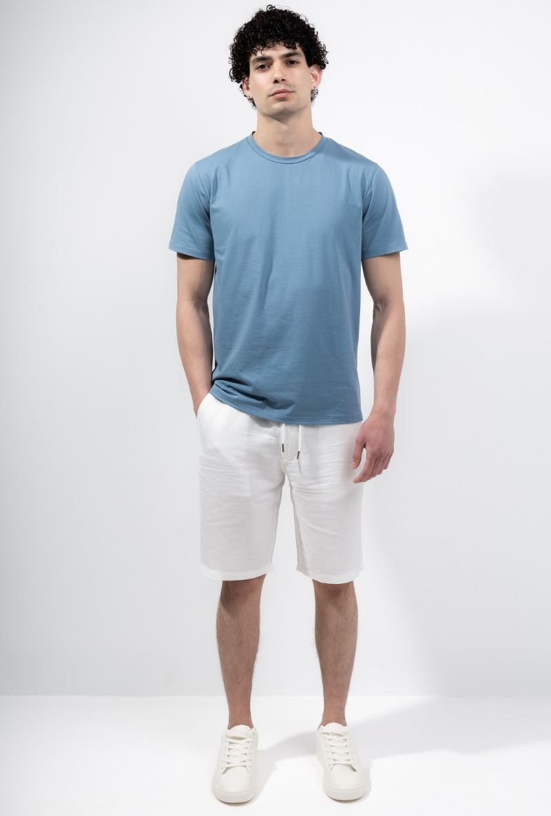 Front image of a model wearing Deep troy ss tshirt in denim, by brand Deep