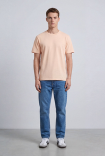 Front image of a model wearing the Deep troy s/s tshirt in peach, by brand Deep