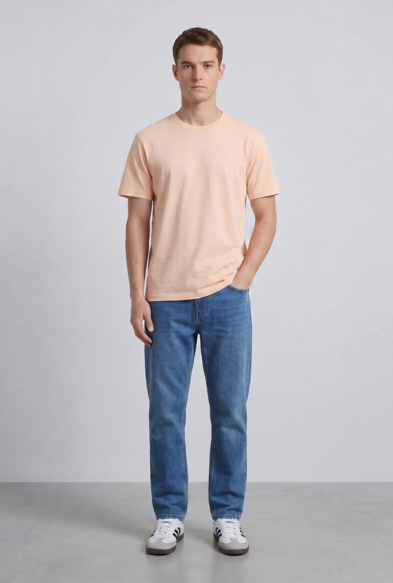 Front image of a model wearing Deep troy s/s tshirt in peach, by brand Deep