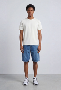 Front image of a model wearing the Deep troy s/s tshirt in white, by brand Deep