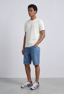 Front image of a model wearing the Deep troy s/s tshirt in white, by brand Deep