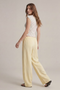 Back image of the Deepstar amara linen trousers in yellow, by brand Deep star