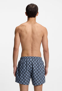 Back image of a model wearing the Hugo aaron swimshorts in navy, by brand Hugo