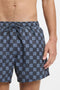 Front detail image of a model wearing the Hugo aaron swimshorts in navy, by brand Hugo