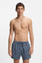 Front image of a model wearing Hugo aaron swimshorts in navy, by brand Hugo