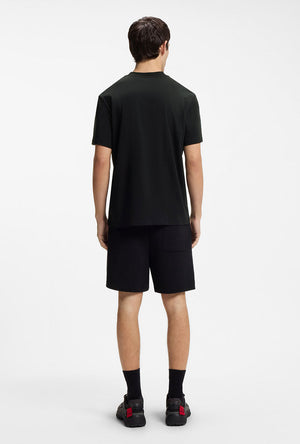 Back image of a model wearing the Dikerd t in black, by brand Hugo