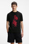Front image of a model wearing Dikerd t in black, by brand Hugo