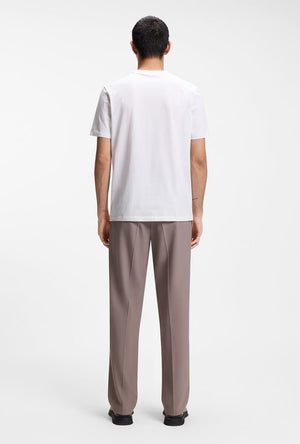 Back image of a model wearing the Discorb t in white, by brand Hugo