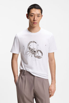 Front image of a model wearing Discorb t in white, by brand Hugo